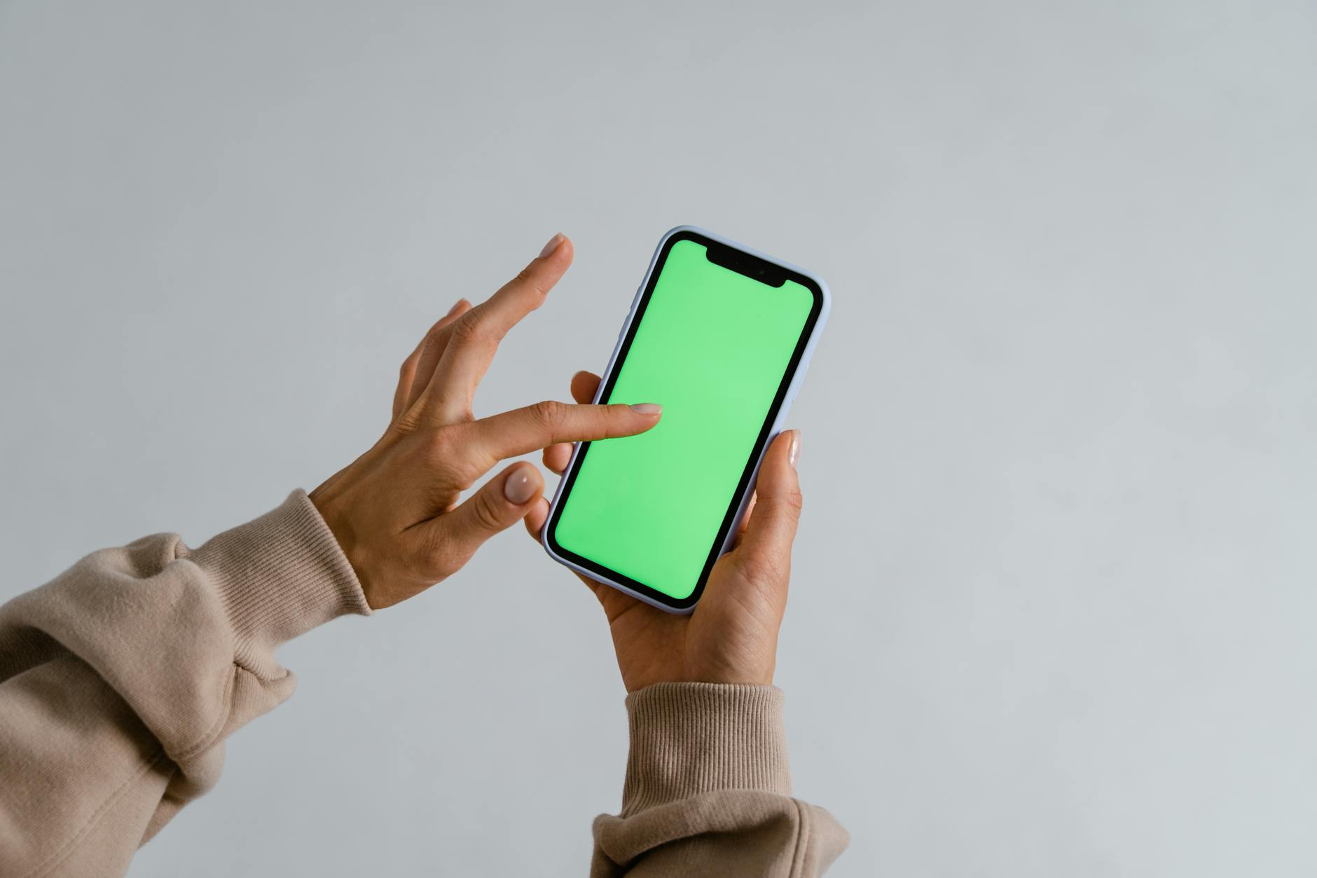 person holding blue and black smartphone