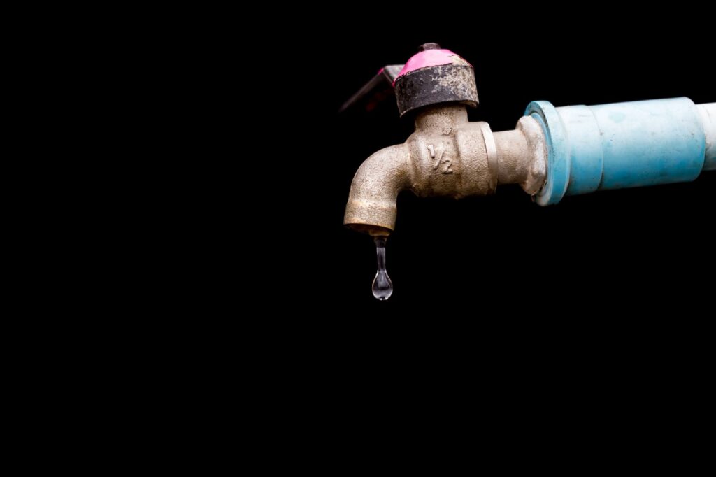 close up photo of tap faucet